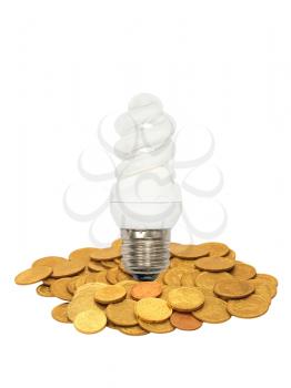 Energy save lamp and coins heap isolated on white background.