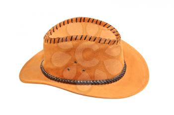 Yellow cowboy hat taken closeup isolated on white background.