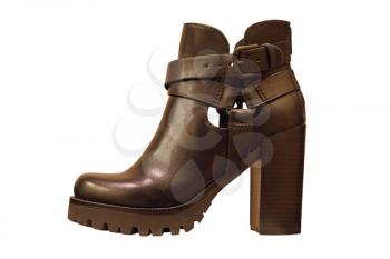 Black leather womanish boot taken closeup isolated on white background.