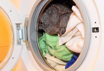 Various clothes in washing machine.