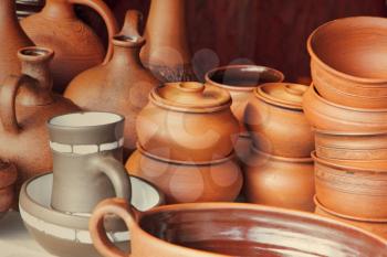 Different kinds of ceramics pots taken closeup.