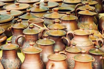 Plenty of ceramics pots for sale taken closeup.