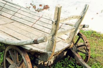 Old wooden cart taken closeup.Toned image.