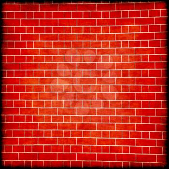 Red brick wall with black border frame suitable as abstract background.