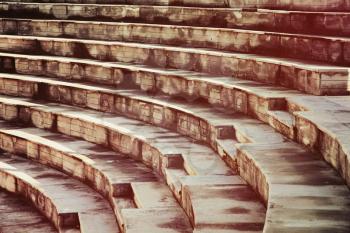 Stone steps of the ancient amphitheater.Toned image.