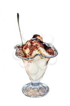 Appetizing ice cream topped with chocolate syrup on isolated white background.