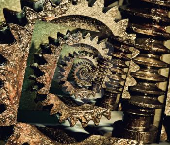 Collage of Gear wheels, cogs and screw of machine part. Digitally altered image