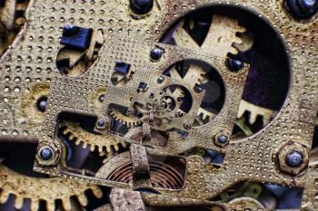 Collage of Bronze Clock Mechanism with cogwheels taken closeup.Digitally altered image.