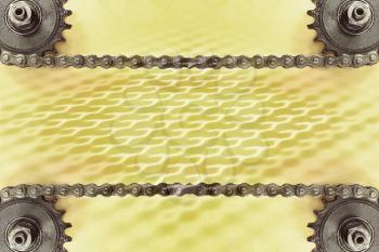 Cogwheels and double chain on yellow background with geometric pattern and empty space.Technology background.