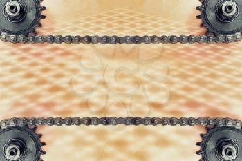 Cogwheels and double chain on grunge background with geometric pattern and empty space for text.Technology background.