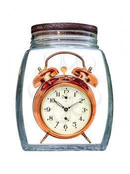 Canned time concept.Retro Alarm Clock preserved in transparent glass jar isolated on white background.