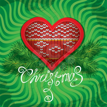 Christmas and New Year card with knitted heart shape and fir tree branches on green background.