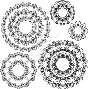 Set of black color round ornaments isolated on white background, kaleidoscope floral patterns. Mandala.
