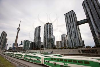 Daytime Photos of Toronto Ontario buildings downtown go train and tracks