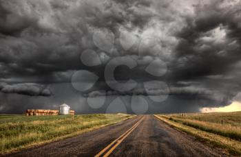 Storm Clouds Saskatchewan billowing clouds and paved road