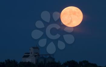 Full Moon and Grain Elevator Saskatchewan Canada