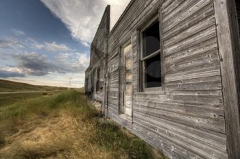Abandoned Farmhouse Saskatchewan Canada sunset and prairie view