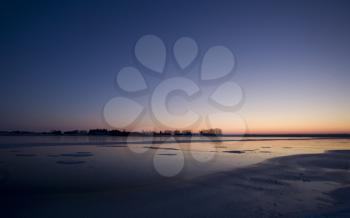 Sunset on Frozen Lake in Saskatchewan Canada