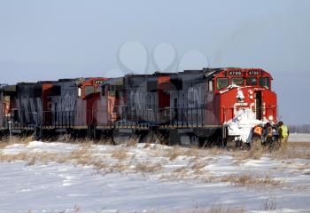 Men working on Train in Saskatchewan Canada in Winter