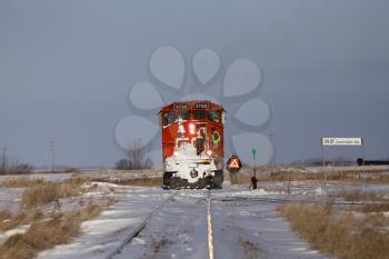 Men working on Train in Saskatchewan Canada in Winter
