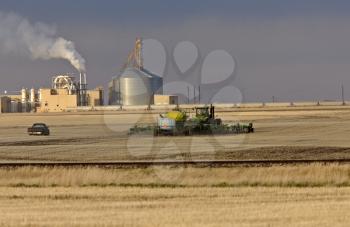 Farming seeding and Potash Industry in Background
