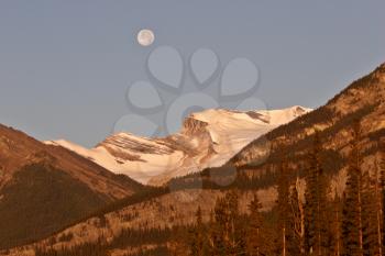 Full moon over mountain icefield