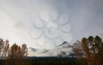 low clouds around British Columbia mountain