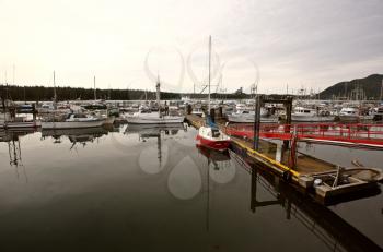 Docked yacht and fishing boats at Port Edward, British Columbia