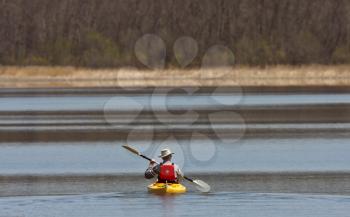 Kayaking on Manitoba lake