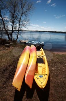 Kayaks at waters edge on Lake Winnipeg