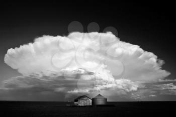 Storm clouds over Saskatchewan granaries