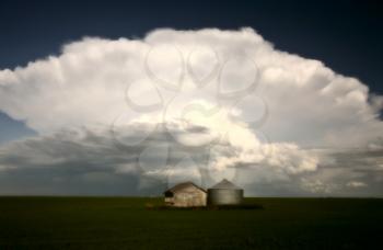 Storm clouds over Saskatchewan granaries