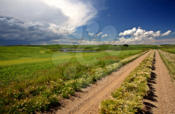 Storm clouds approching Saskatchewan country road