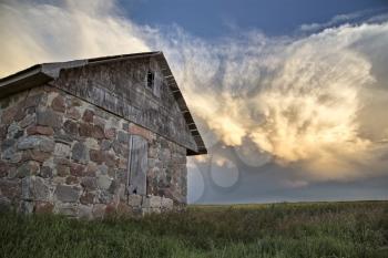 Storm Clouds Saskatchewan Prairie scene Stone house