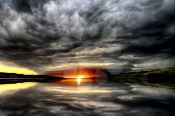 Storm Clouds Lake Sunset in Saskatchewan Canada