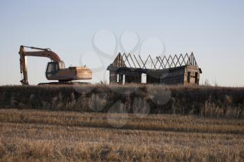 Abandoned Buildings Saskatchewan rural back hoe