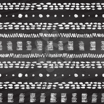 Hand drawn grunge black and white chalked seamless pattern with stripes, zigzag, paint daubs and dots on black chalkboard background.