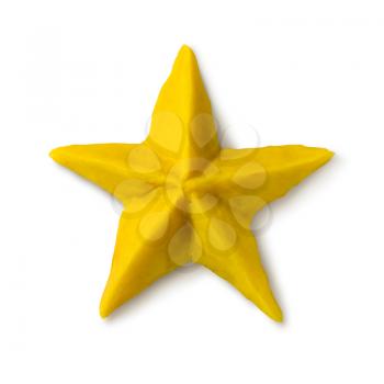 Hand made plasticine figure of Christmas star with shadow on white background.