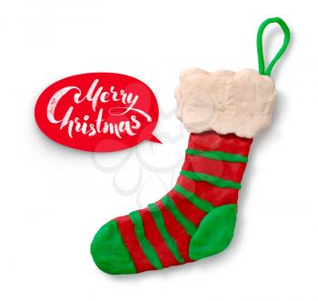 Hand made plasticine figure of Christmas sock with shadow on white background and red lettering banner.