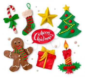 Hand made colored plasticine collection of Christmas symbols on white background with lettering.