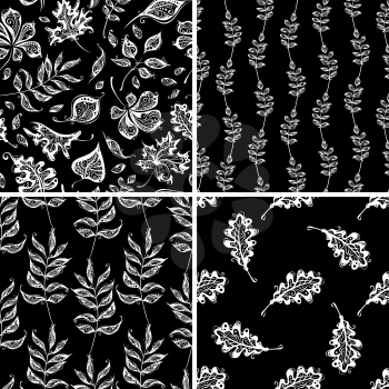 Vector black and white backgrounds of vintage leaves.