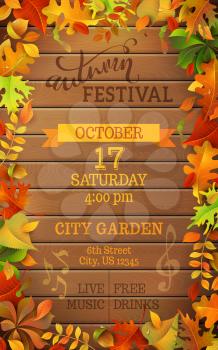Bright colourful autumn leaves on vertical wood background. You can place your text in the center.