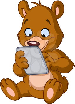 Sitting teddy bear using a tablet pc