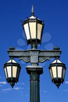 green street lamp and clouds in  buenos aires argentina