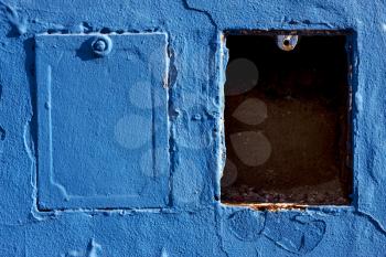 two metal box and a blue wall in la boca buenos aires argentina