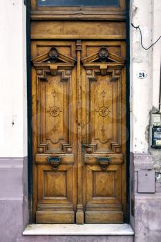 a brown wood old door in the centre of buenos aires argentina