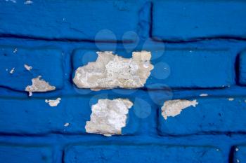 colored and broken blue wall   in colonia del sacramento uruguay