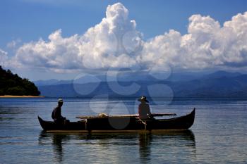 two man in a boat in madagascar for fishing