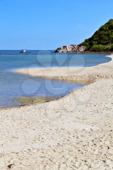 asia in  kho phangan thailand bay isle white  beach    rocks pirogue  and south china sea 