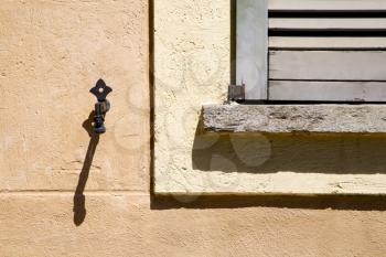 jerago window  varese palaces italy   abstract  sunny day    wood venetian blind in the concrete  brick